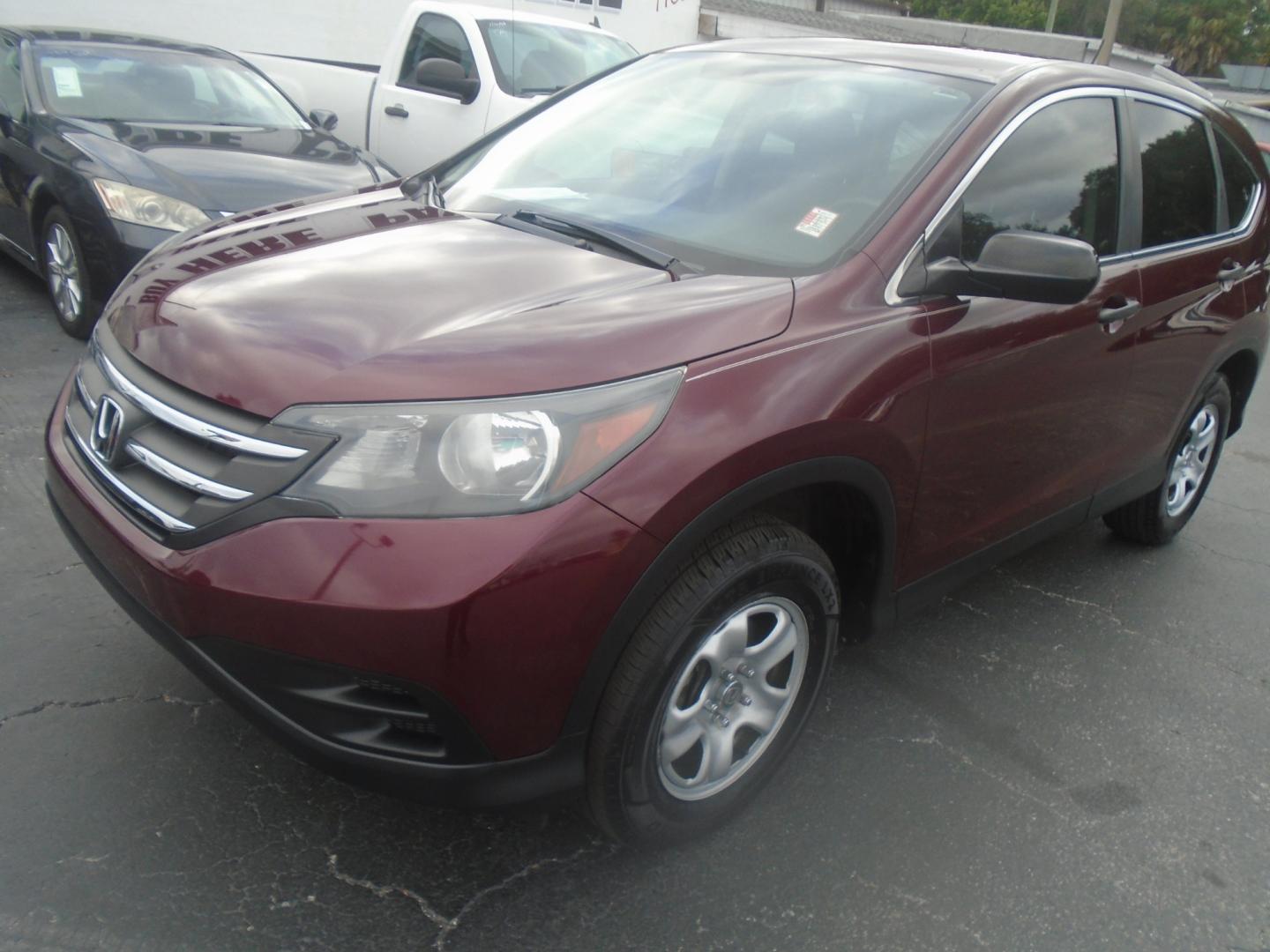 2014 Honda CR-V LX 4WD 5-Speed AT (5J6RM4H39EL) with an 2.4L L4 DOHC 16V engine, 5-Speed Automatic transmission, located at 6112 N Florida Avenue, Tampa, FL, 33604, (888) 521-5131, 27.954929, -82.459534 - Photo#3